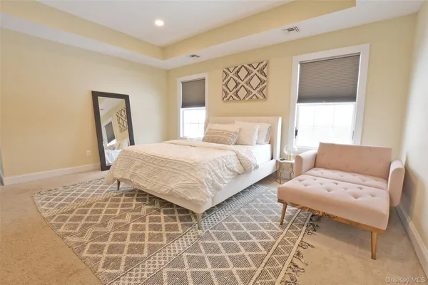 a view of a livingroom with furniture and a table