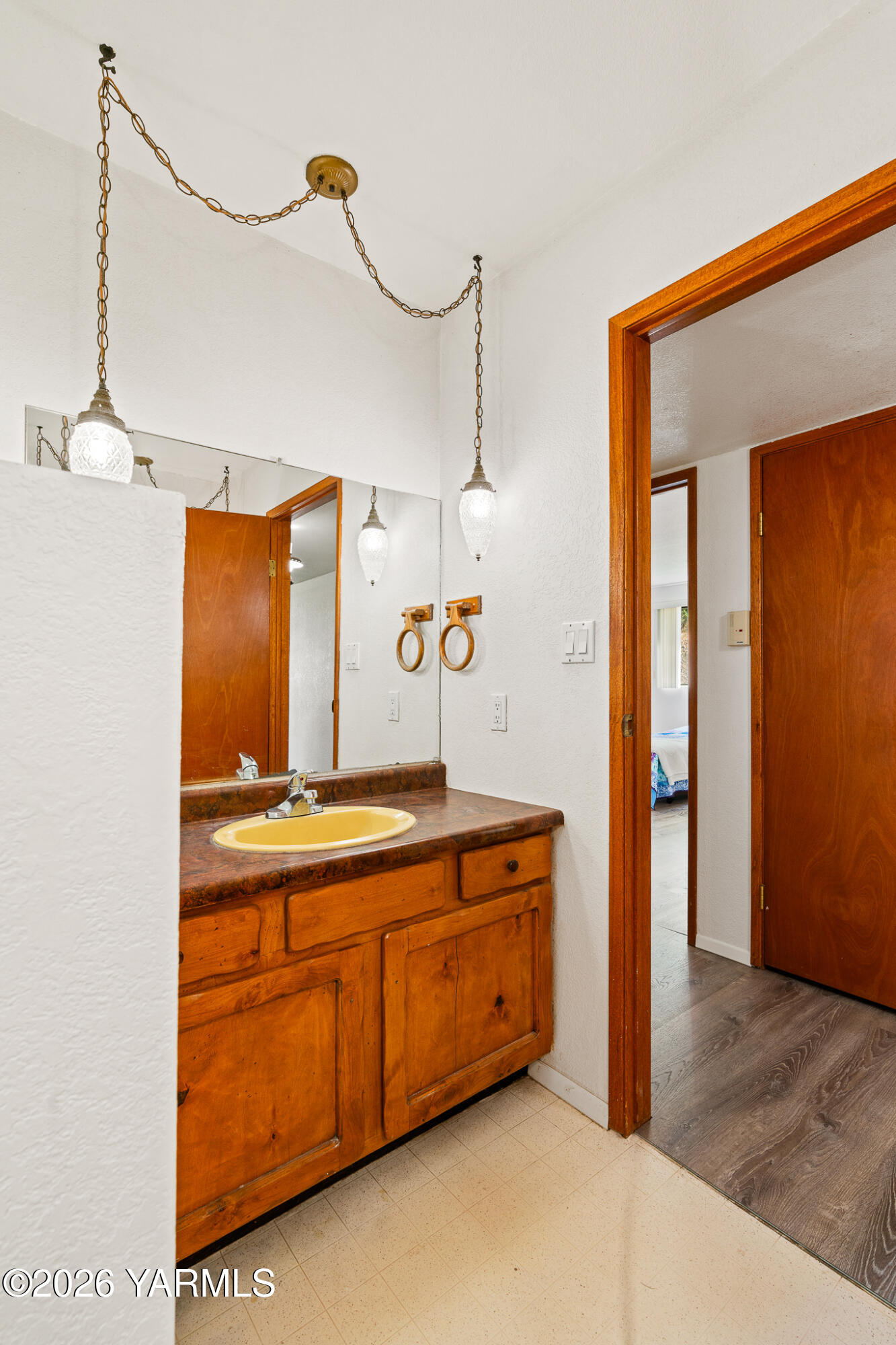 13619 Summitview Ext Road Yakima, WA 98908 - Photo 41 of 56 a bathroom with a sink a mirror and a shower