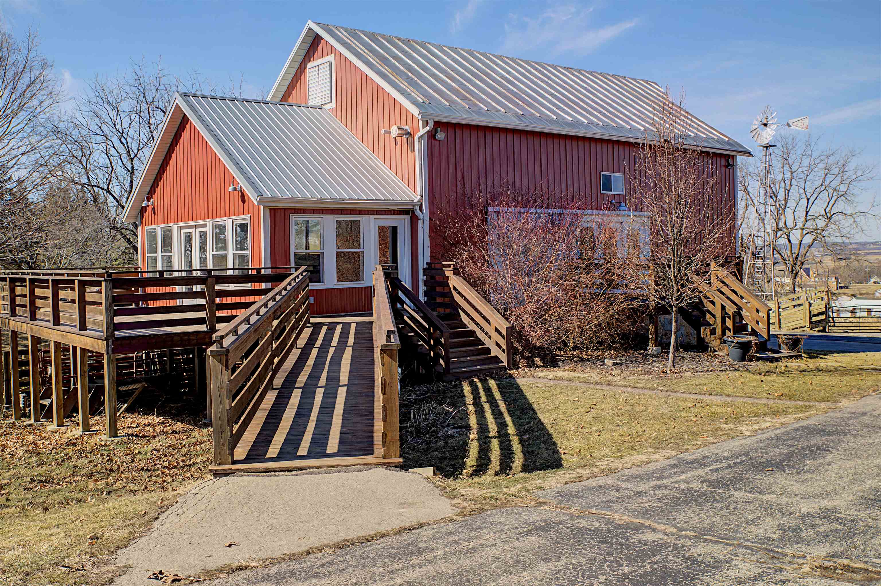 115 Windmill Road Elizabeth, IL 61028 - Photo 36 of 66 a view of a house with wooden deck