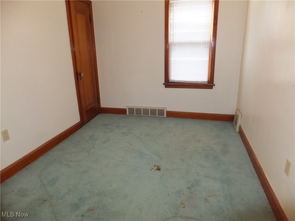 5113 Snow Road Cleveland, OH 44134 - Photo 26 of 40 View of carpeted empty room