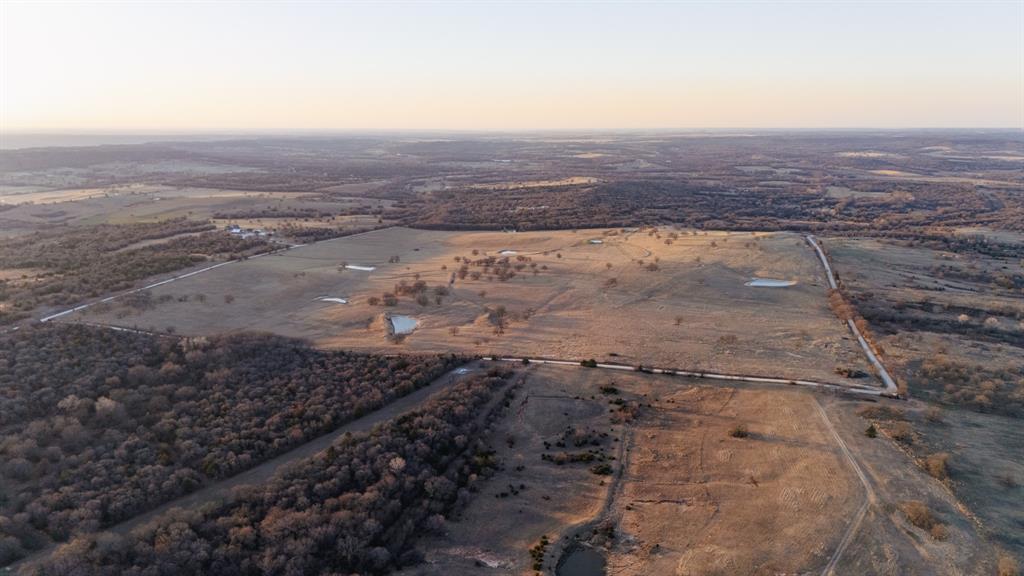 Tbd Odom Road Nocona, TX 76255 - Photo 13 of 28 an aerial view of house with yard