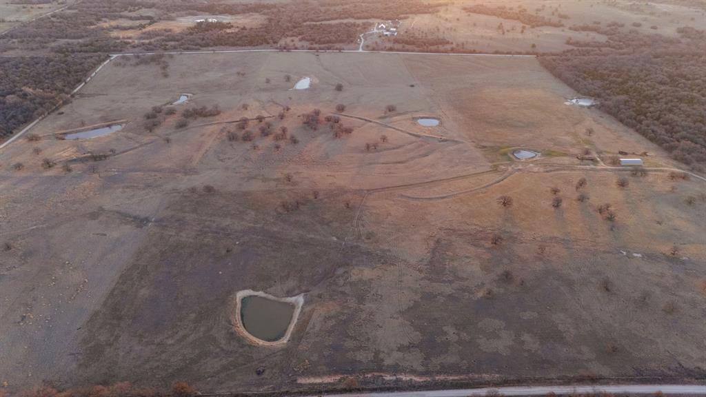 Tbd Odom Road Nocona, TX 76255 - Photo 26 of 28 a bathroom with a shower