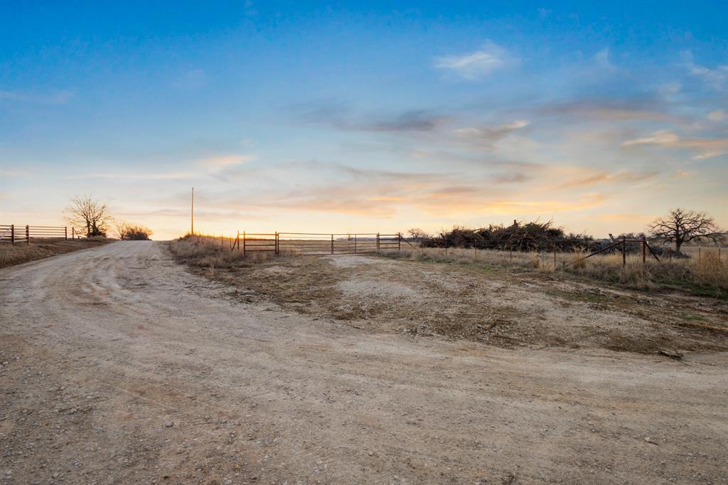 Tbd Odom Road Nocona, TX 76255 - Photo 27 of 28 a view of a dry yard with wooden fence