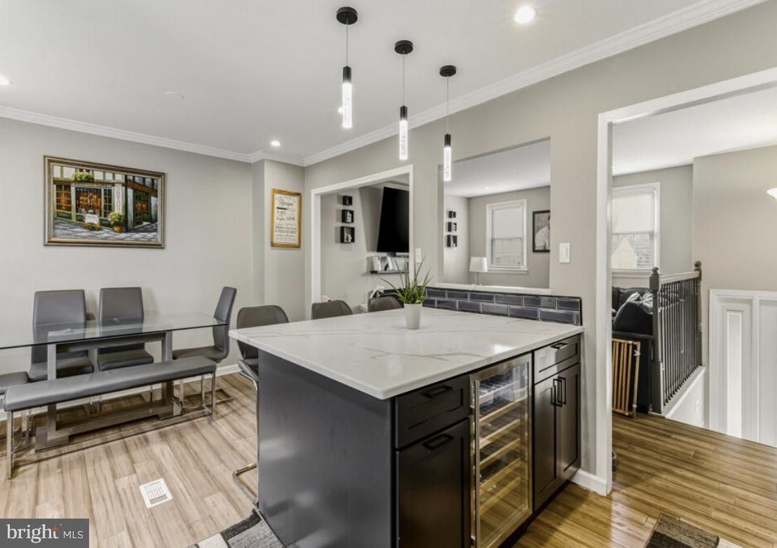 27 Lincoln Drive Clementon, NJ 08021 - Photo 11 of 31 a open kitchen with stainless steel appliances kitchen island a stove and a refrigerator