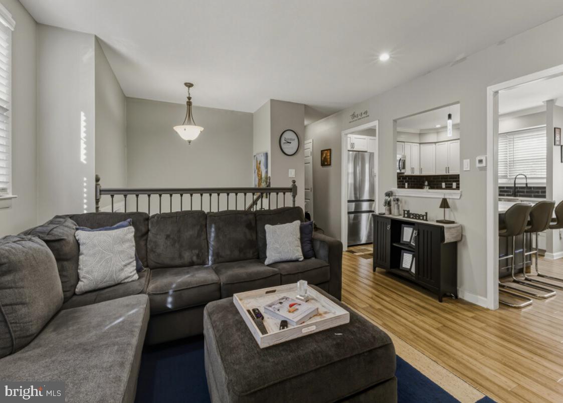 27 Lincoln Drive Clementon, NJ 08021 - Photo 12 of 31 a living room with furniture and a wooden floor