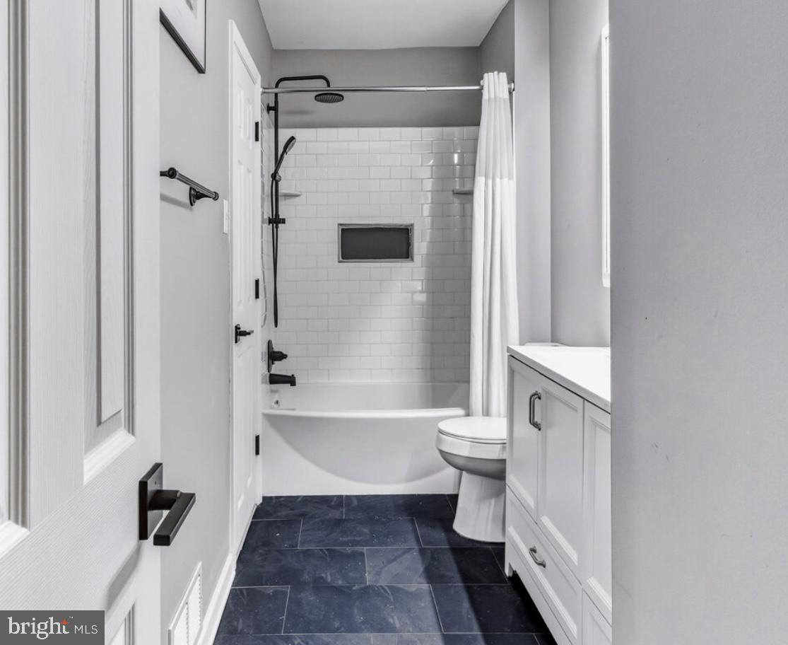27 Lincoln Drive Clementon, NJ 08021 - Photo 17 of 31 a bathroom with a bathtub shower sink vanity and toilet