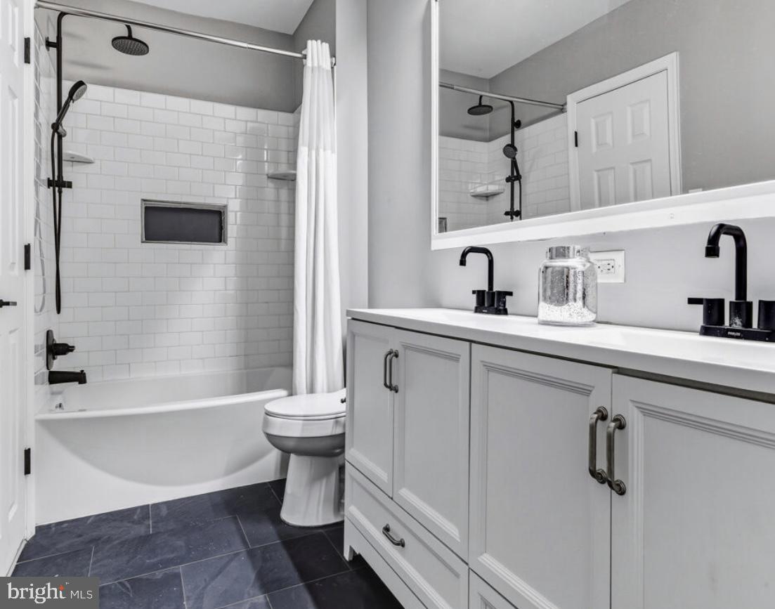 27 Lincoln Drive Clementon, NJ 08021 - Photo 18 of 31 a bathroom with a sink a toilet and shower