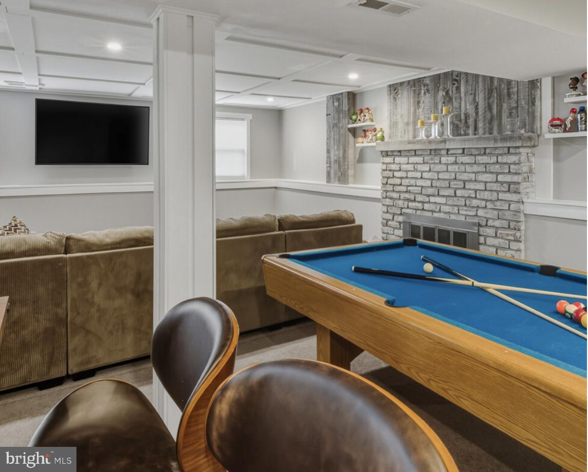 27 Lincoln Drive Clementon, NJ 08021 - Photo 27 of 31 a view of a livingroom with furniture and flat screen tv