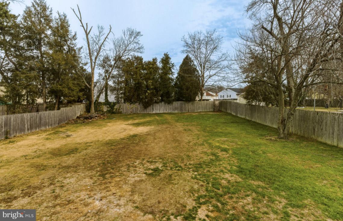 27 Lincoln Drive Clementon, NJ 08021 - Photo 6 of 31 a view of a yard with a tree