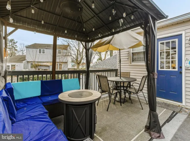 a view of a chairs and table in the patio