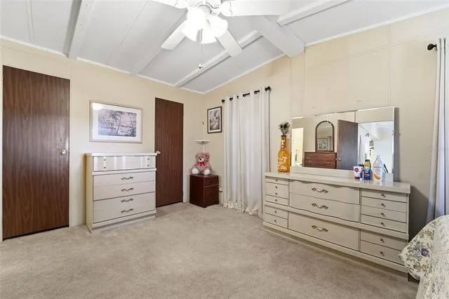 a room with furniture and mirror