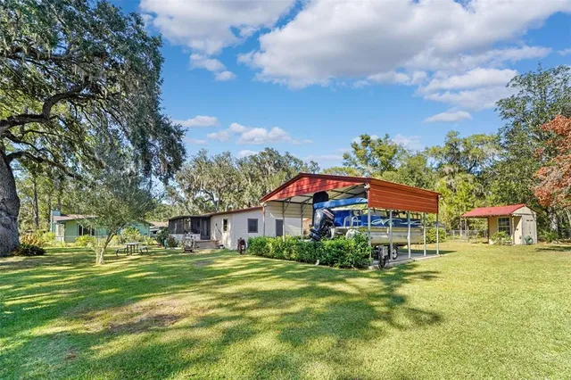 a front view of a building with garden