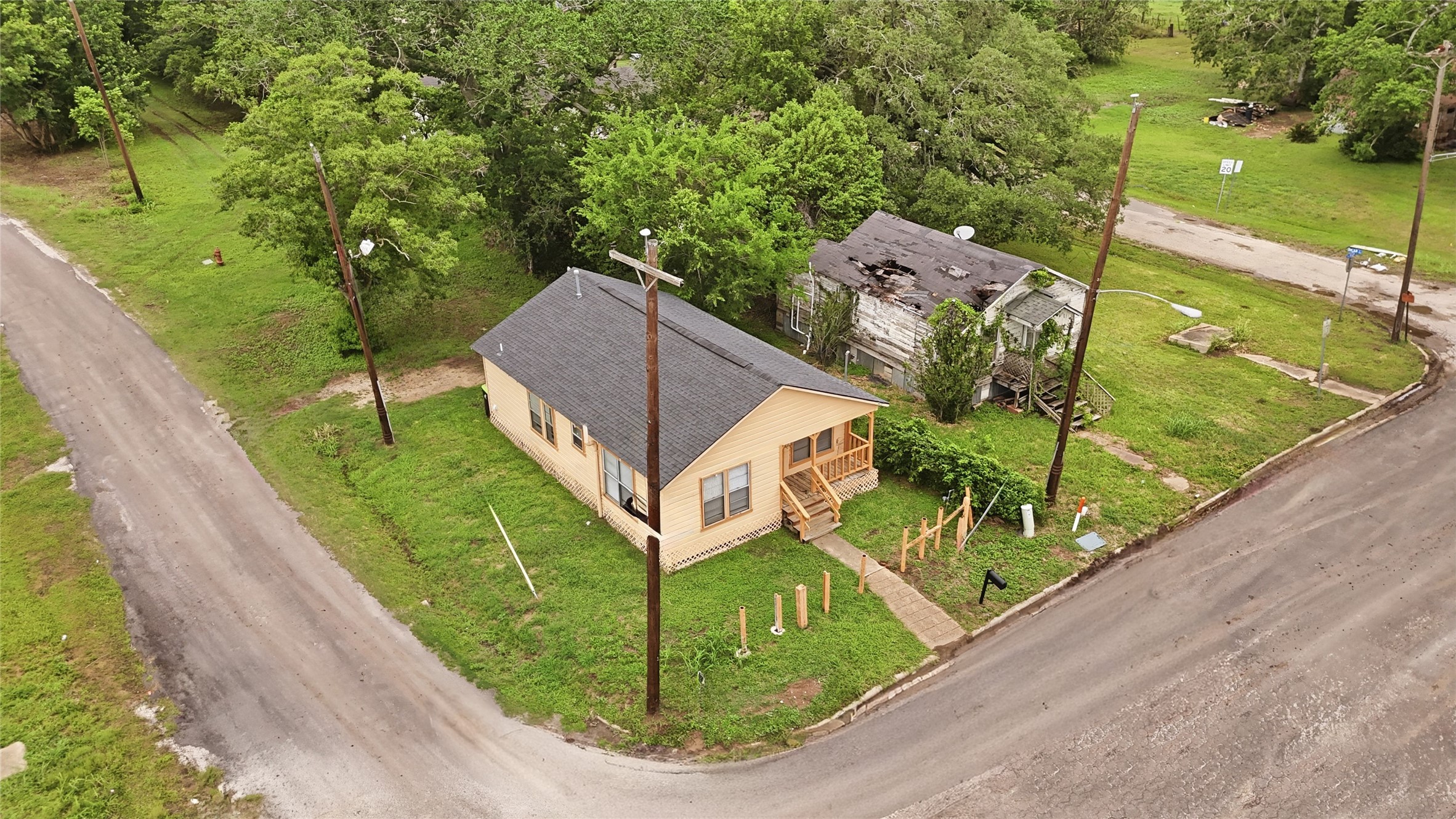 101 Outlar Street Wharton, TX 77488 - Photo 20 of 40 an aerial view of a house with a yard
