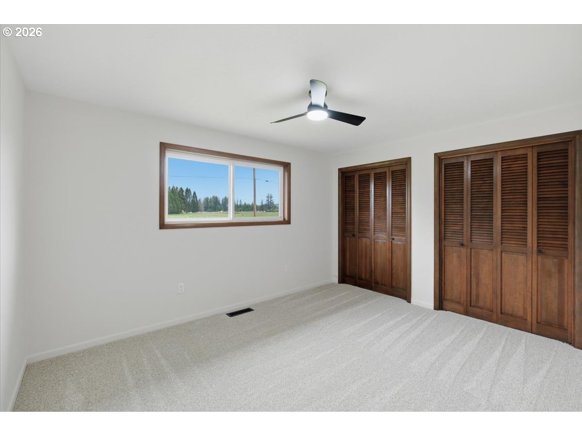2610 Shaff Road Southeast Aumsville, OR 97325 - Photo 16 of 25 a view of an empty room with a window
