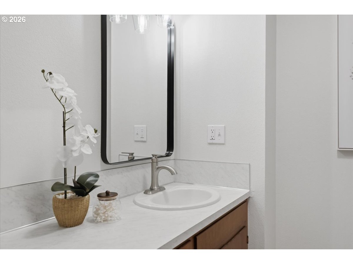 2610 Shaff Road Southeast Aumsville, OR 97325 - Photo 18 of 25 a bathroom with a sink and a mirror