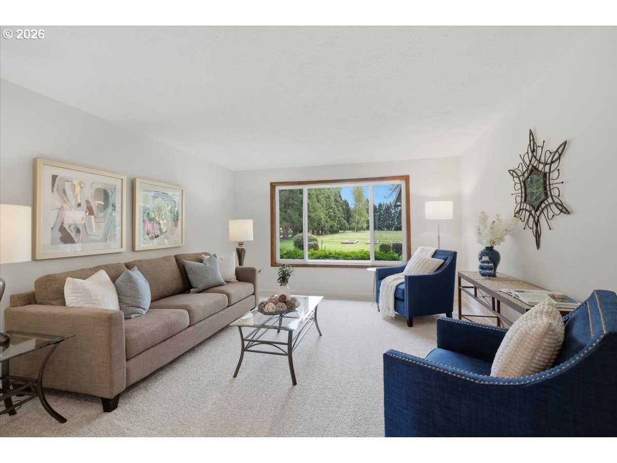2610 Shaff Road Southeast Aumsville, OR 97325 - Photo 5 of 25 a living room with furniture and a large window