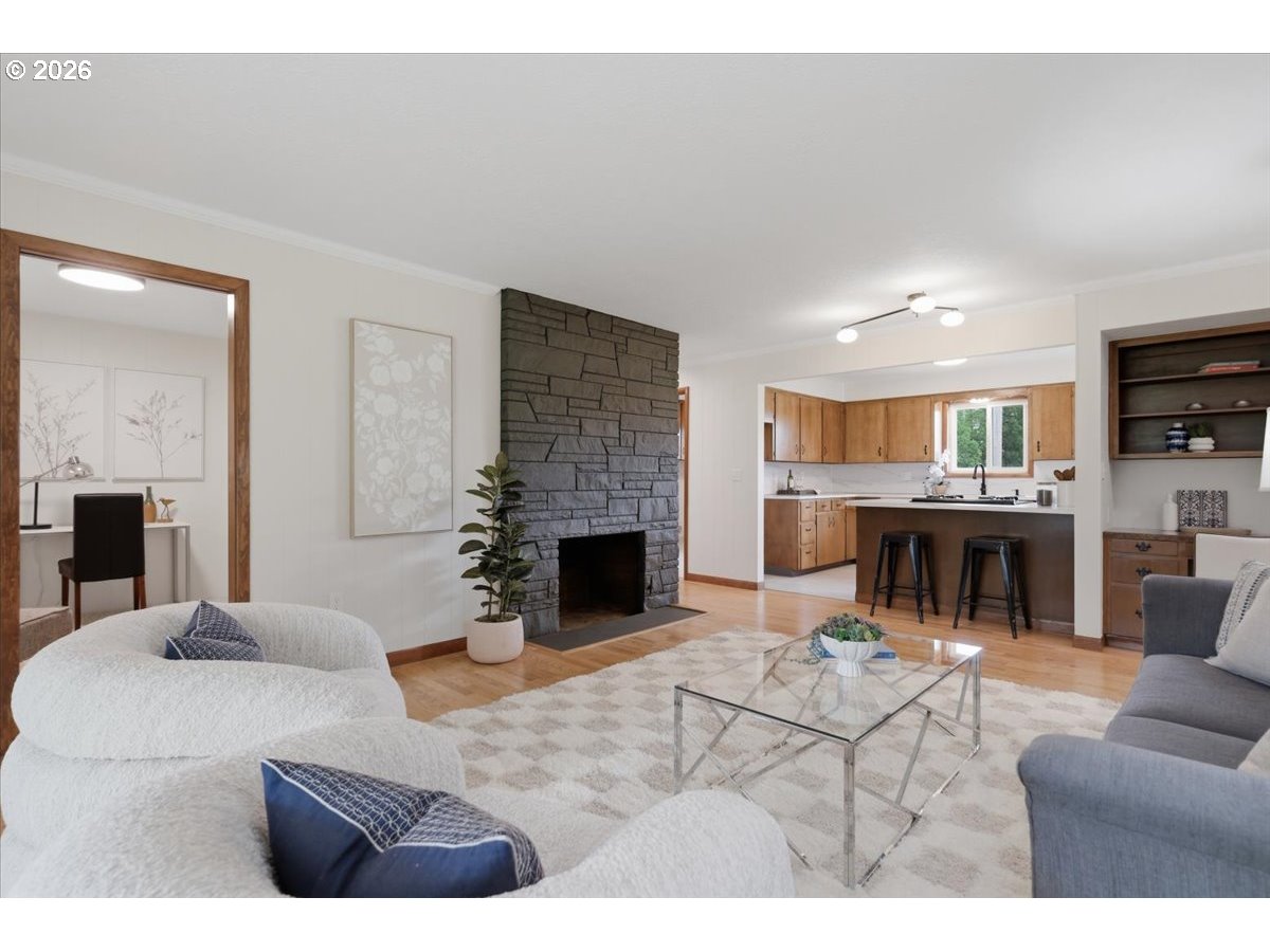 2610 Shaff Road Southeast Aumsville, OR 97325 - Photo 6 of 25 a living room with furniture and a fireplace