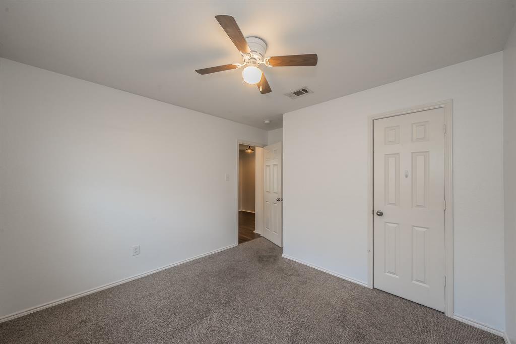 10541 Rising Knoll Lane Fort Worth, TX 76131 - Photo 19 of 27 a view of an empty room
