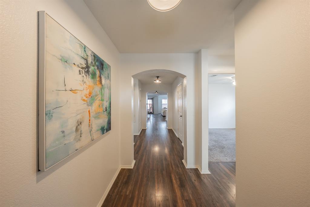 10541 Rising Knoll Lane Fort Worth, TX 76131 - Photo 4 of 27 a view of gallery with wooden floor