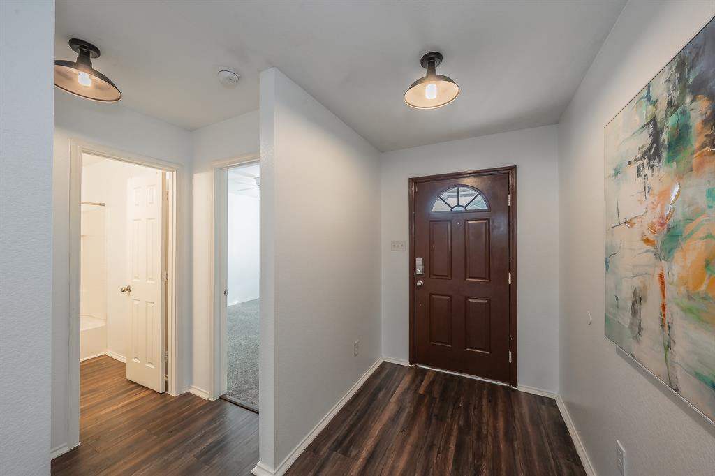 10541 Rising Knoll Lane Fort Worth, TX 76131 - Photo 5 of 27 a view of entryway with wooden floor