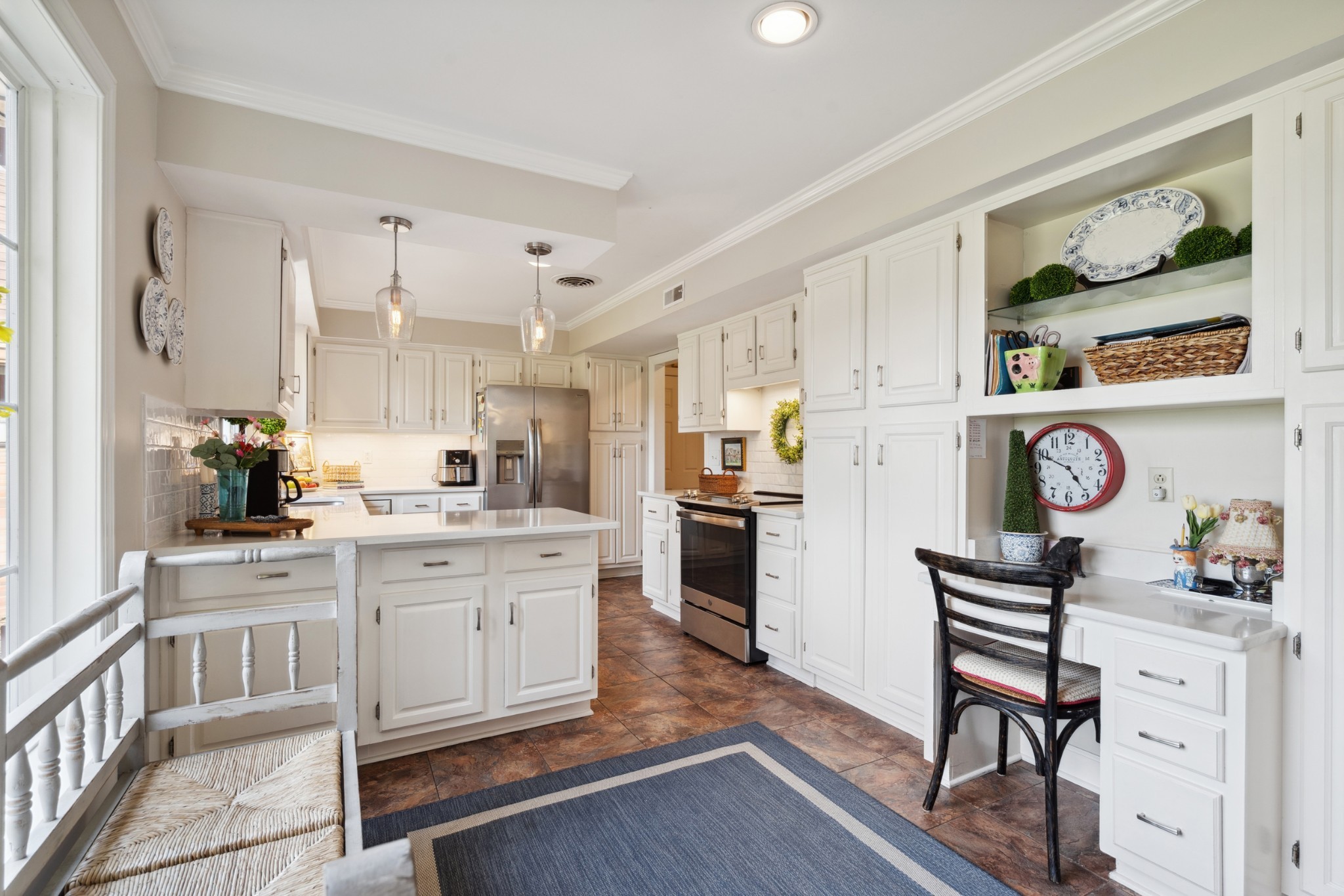 5013 Baker Road Murfreesboro, TN 37129 - Photo 14 of 55 a kitchen with cabinets and wooden floor