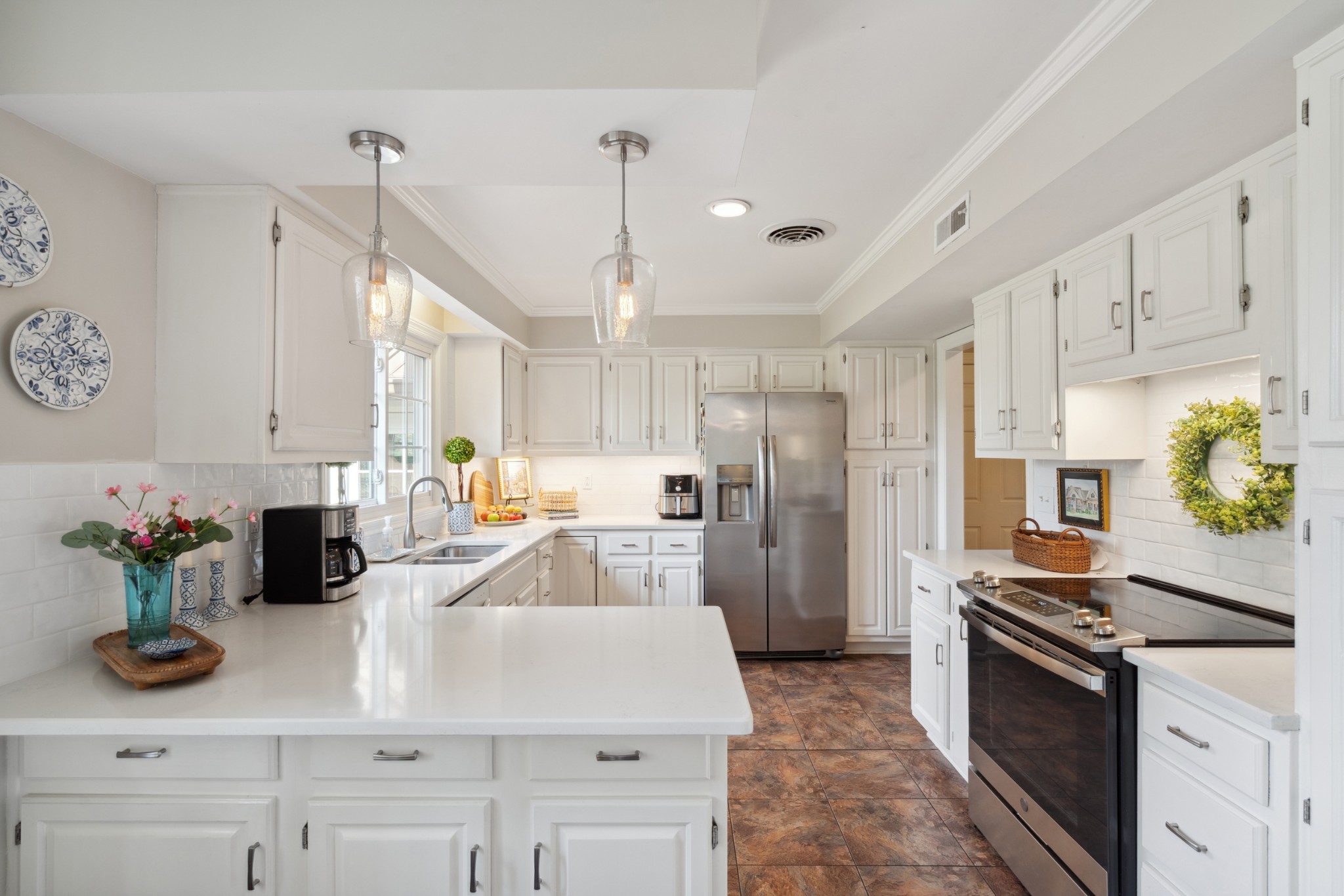 5013 Baker Road Murfreesboro, TN 37129 - Photo 15 of 55 a kitchen with refrigerator and stove