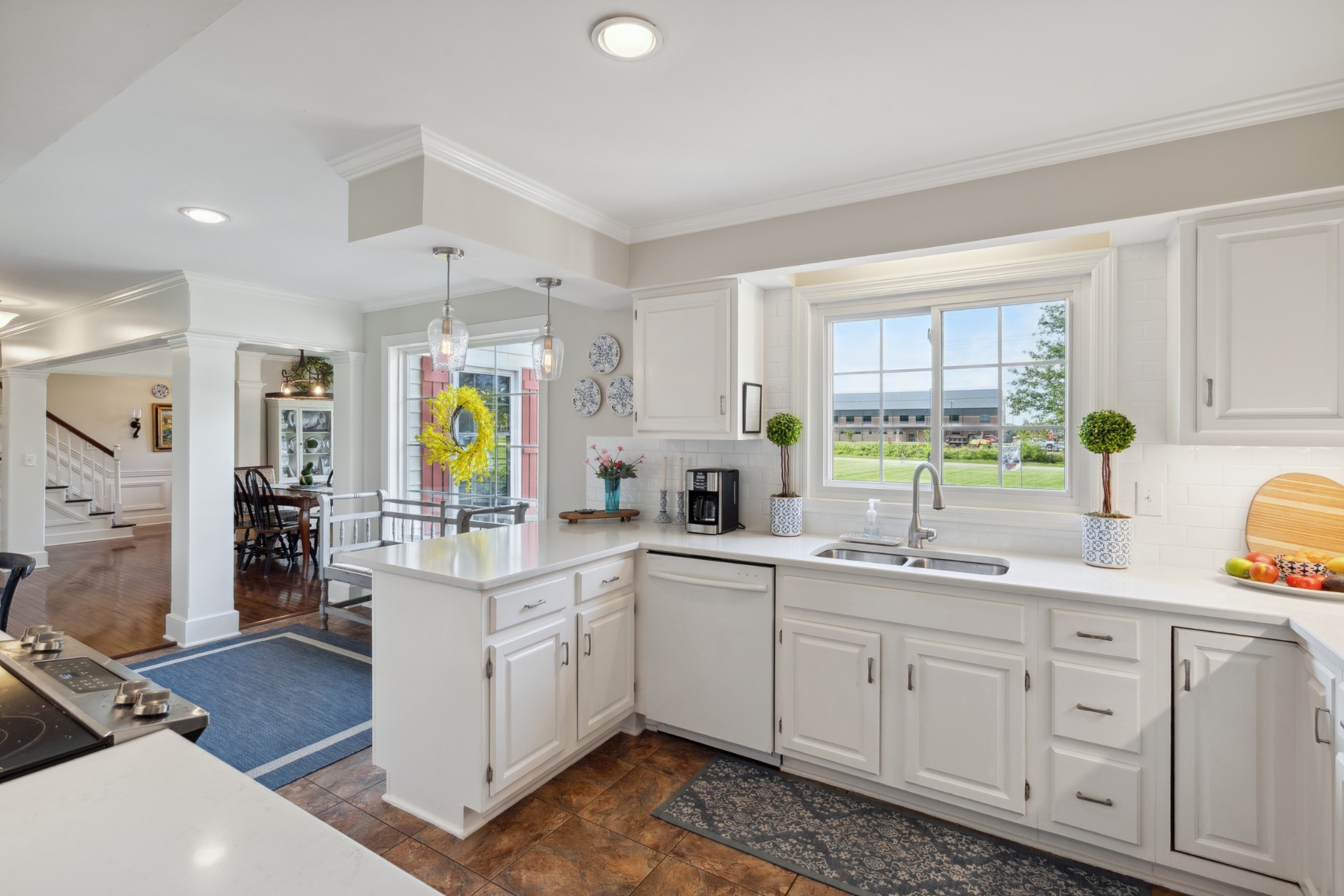 5013 Baker Road Murfreesboro, TN 37129 - Photo 17 of 55 a kitchen with cabinets a sink and white appliances