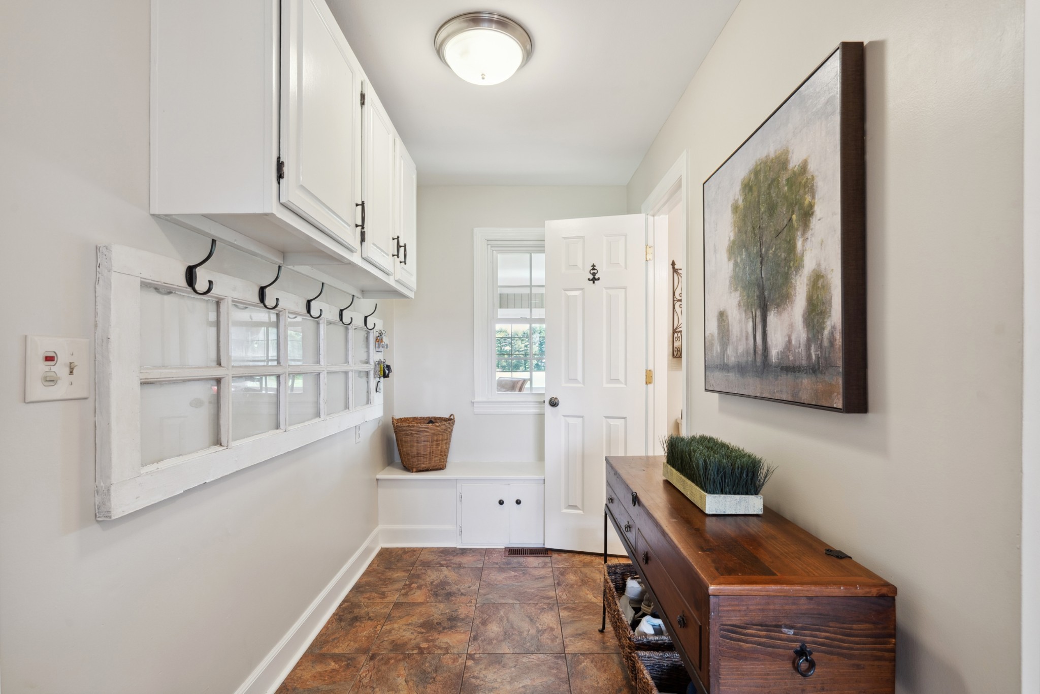 5013 Baker Road Murfreesboro, TN 37129 - Photo 18 of 55 a living room with furniture and a painting on the wall