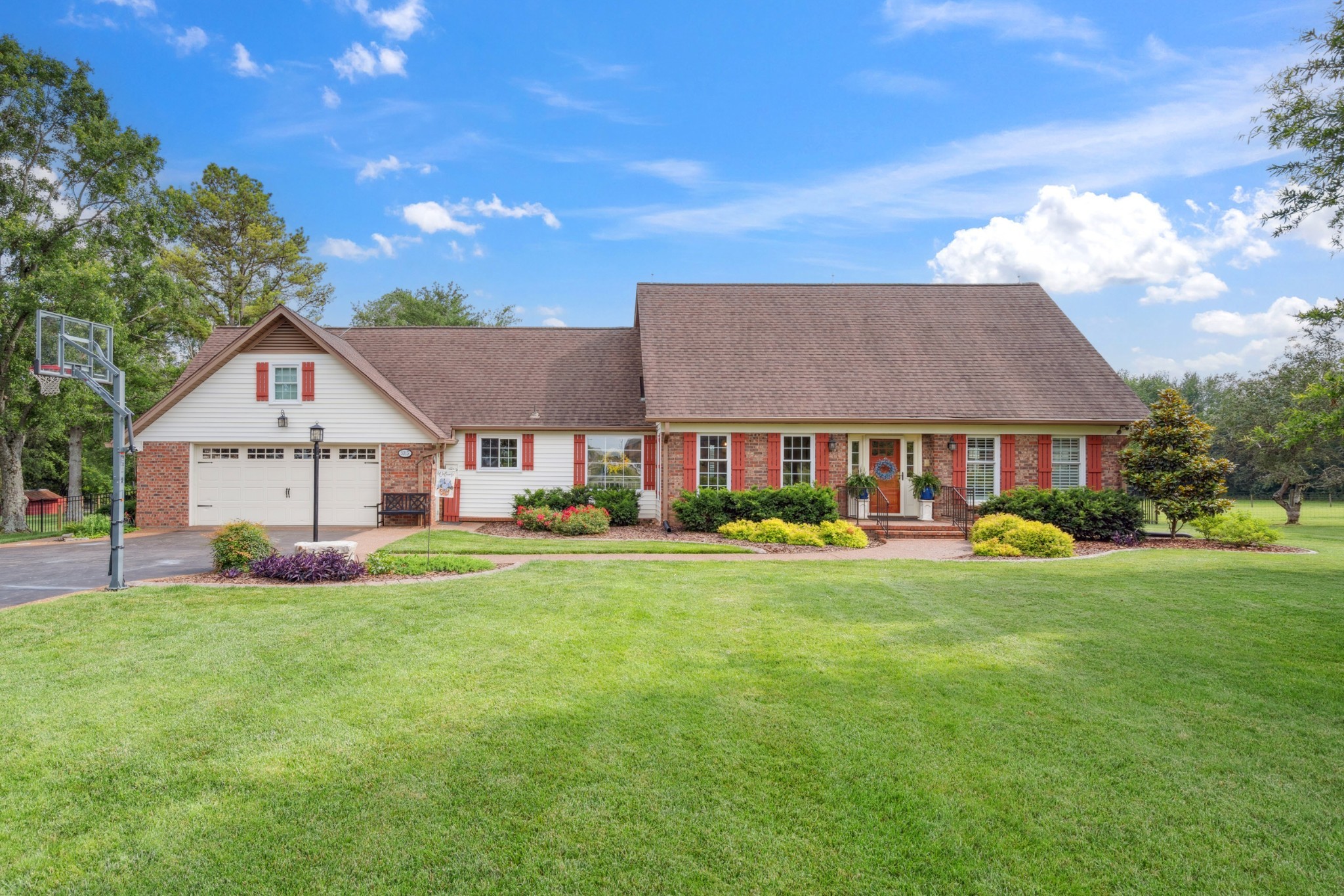 5013 Baker Road Murfreesboro, TN 37129 - Photo 2 of 55 a front view of house with yard and green space