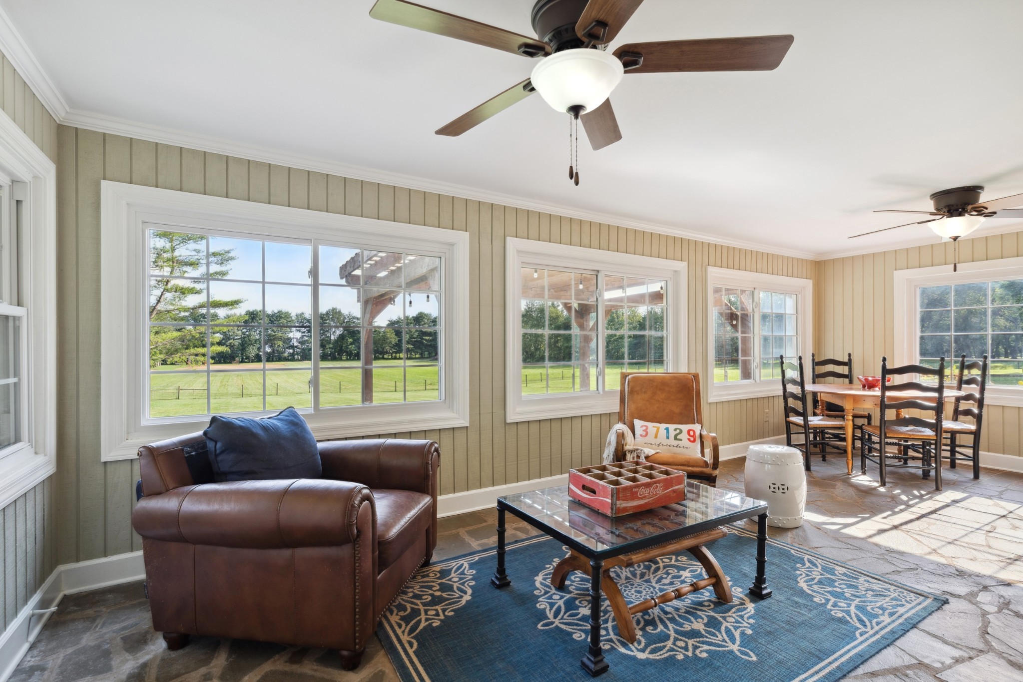 5013 Baker Road Murfreesboro, TN 37129 - Photo 24 of 55 a living room with furniture a table and a large window