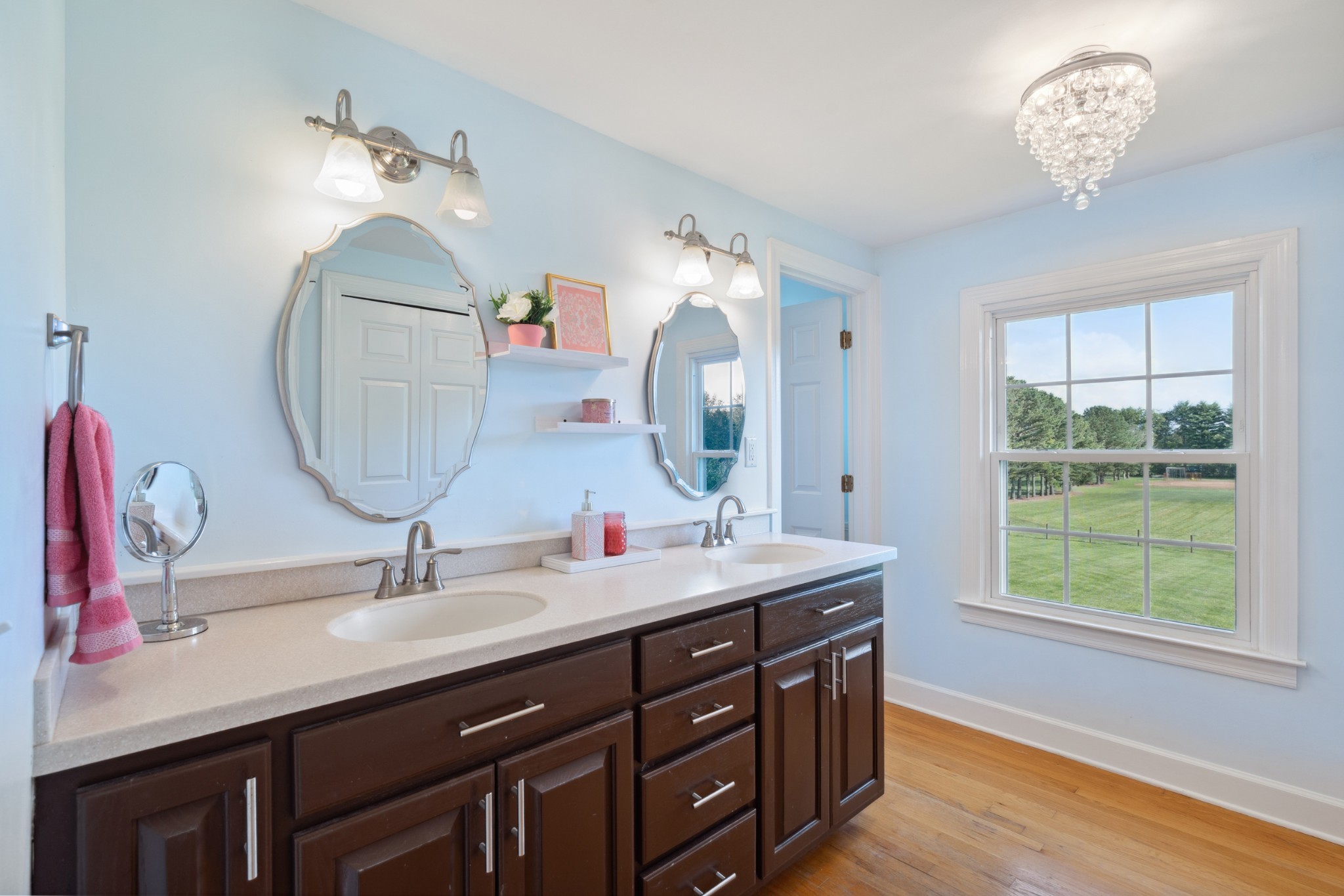 5013 Baker Road Murfreesboro, TN 37129 - Photo 36 of 55 a bathroom with a double vanity sink and a mirror