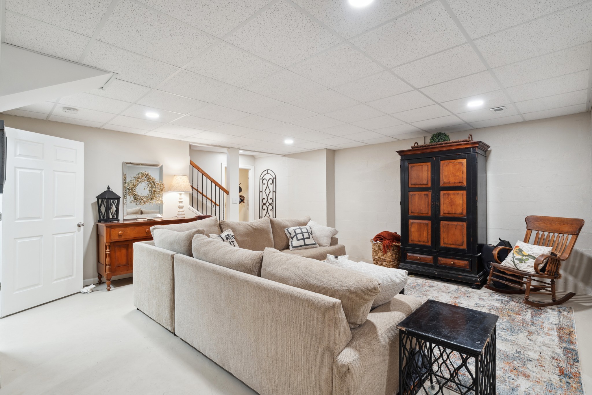 5013 Baker Road Murfreesboro, TN 37129 - Photo 43 of 55 a living room with furniture a window and gym equipment