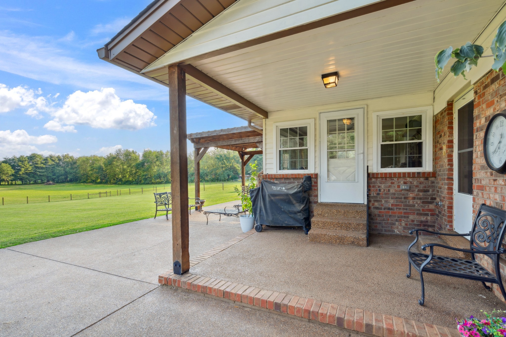 5013 Baker Road Murfreesboro, TN 37129 - Photo 49 of 55 a view of a porch with furniture and garden