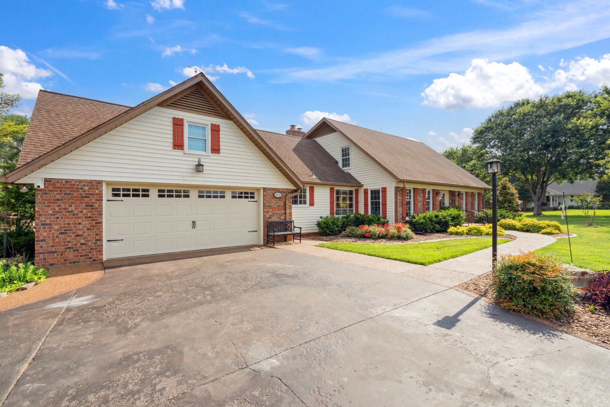 5013 Baker Road Murfreesboro, TN 37129 - Photo 5 of 55 a view of a house with swimming pool and a yard