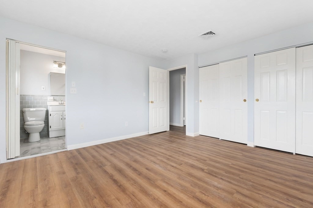 42 Amherst Road Beverly, MA 01915 - Photo 17 of 23 a view of an empty room with wooden floor
