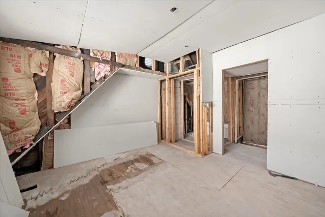 a view of a hallway with staircase