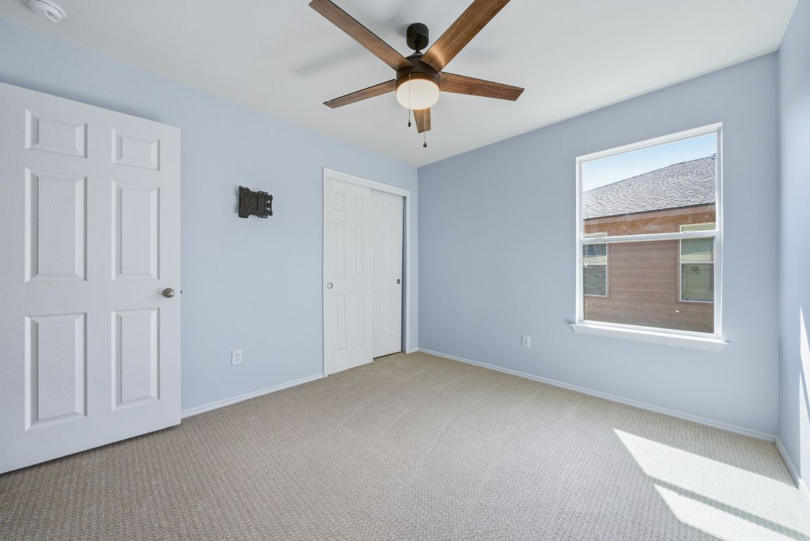 18153 Basket Flower Bend Elgin, TX 78621 - Photo 13 of 35 a view of an empty room with a window