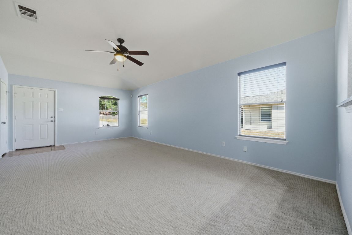 18153 Basket Flower Bend Elgin, TX 78621 - Photo 5 of 35 a view of an empty room with a window