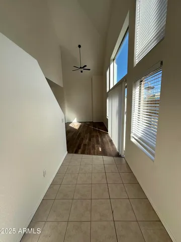 a view of a hallway with a window