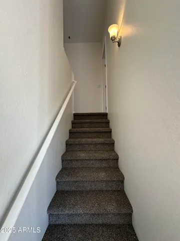 an empty room with wooden floor