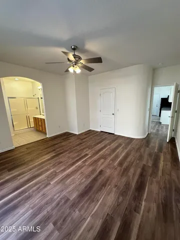 a bathroom with a double vanity sink mirror and shower