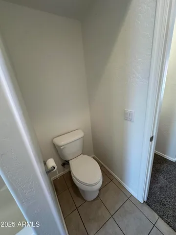 a view of a swimming pool with outdoor seating