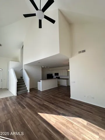 a view of a hallway view with staircase