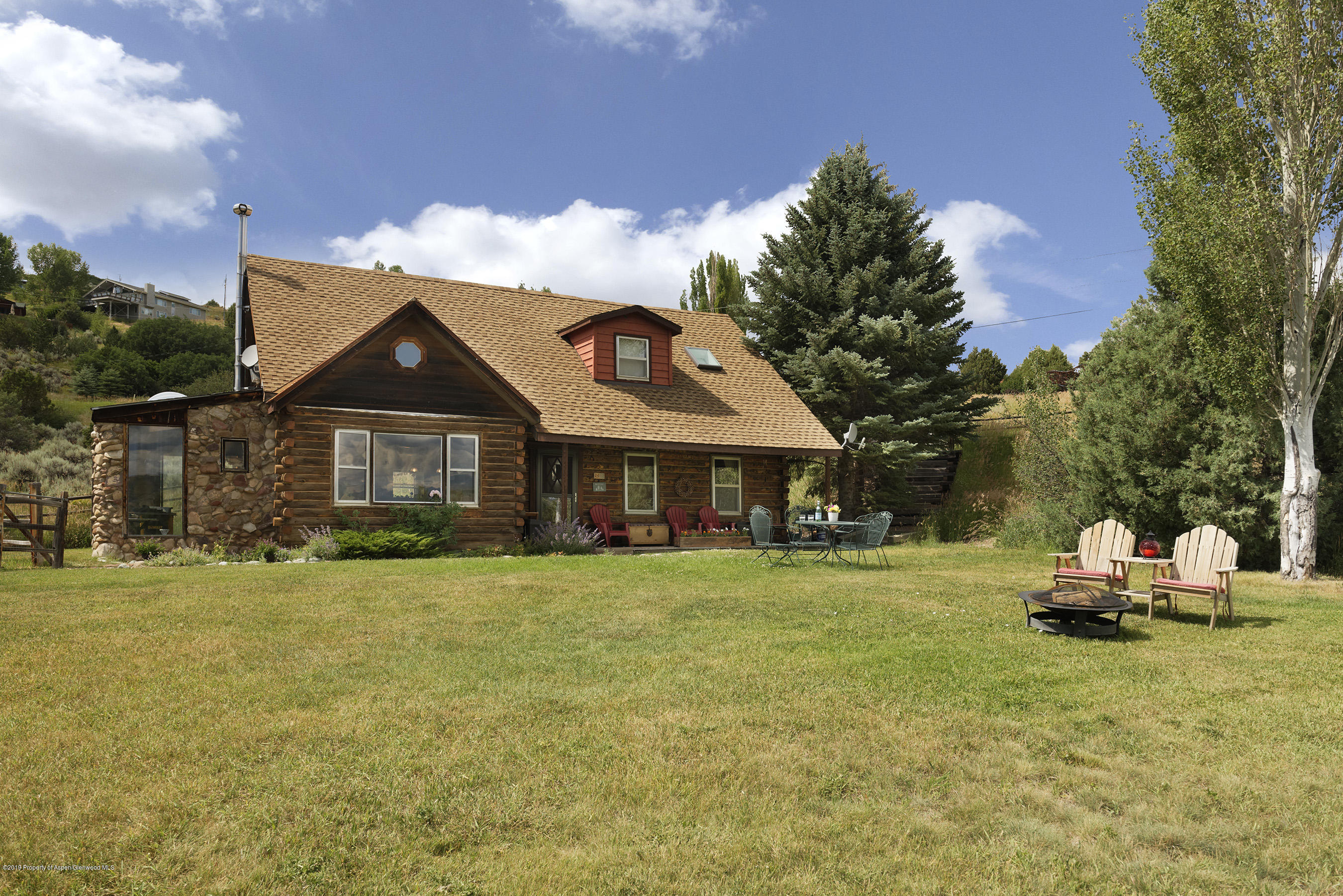 1340 Gateway Road Snowmass, CO 81654 - Photo 2 of 32 Log home with great lawn