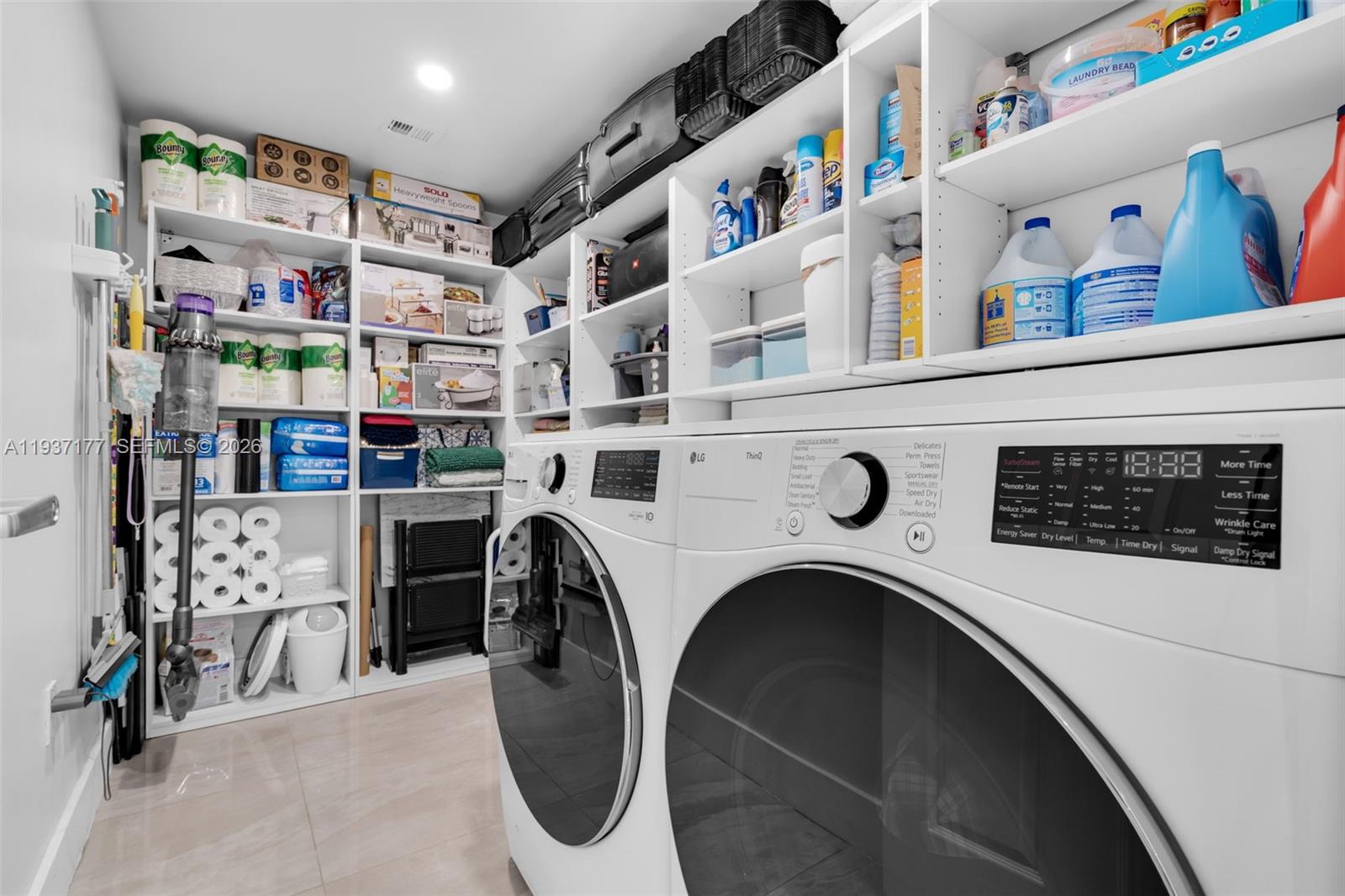 3130 Northwest 102nd Street Miami, FL 33147 - Photo 25 of 42 a utility room with dryer and washer