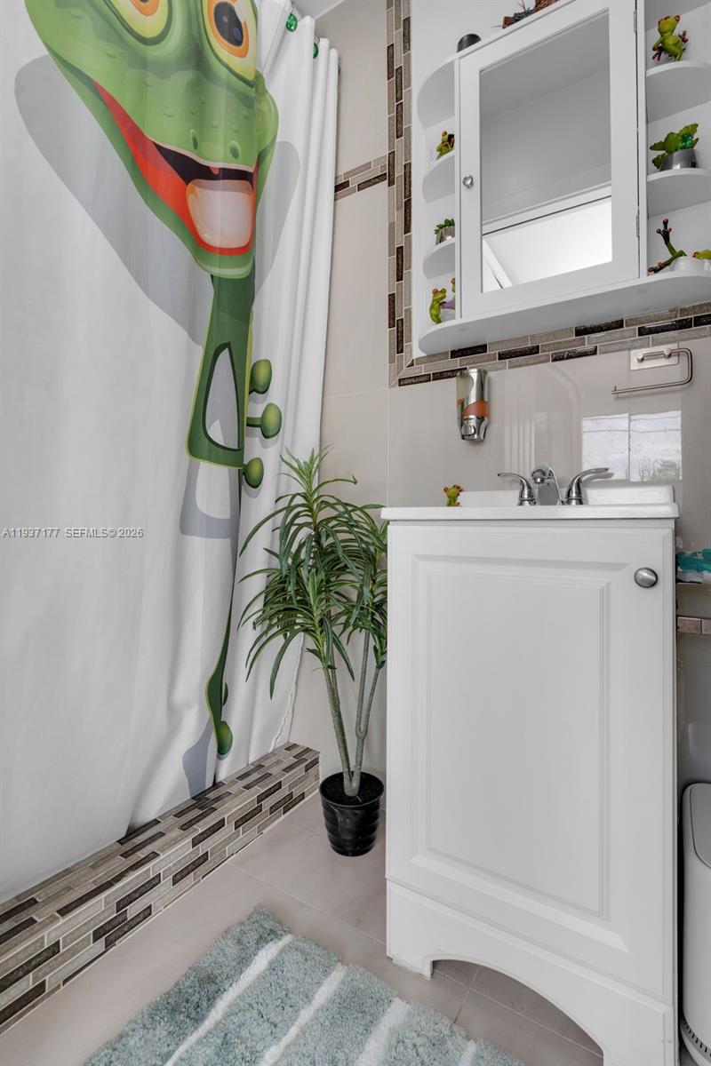 3130 Northwest 102nd Street Miami, FL 33147 - Photo 31 of 42 a view of storage and utility room