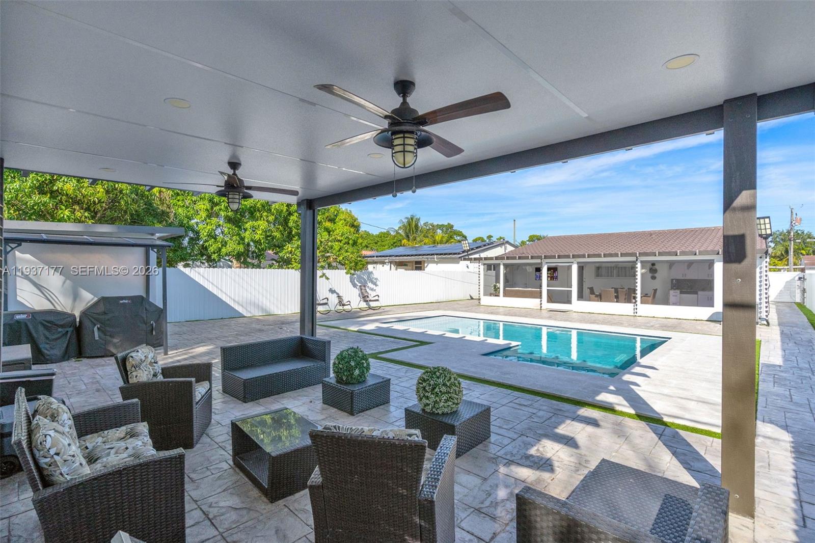 3130 Northwest 102nd Street Miami, FL 33147 - Photo 38 of 42 a front view of a house with patio