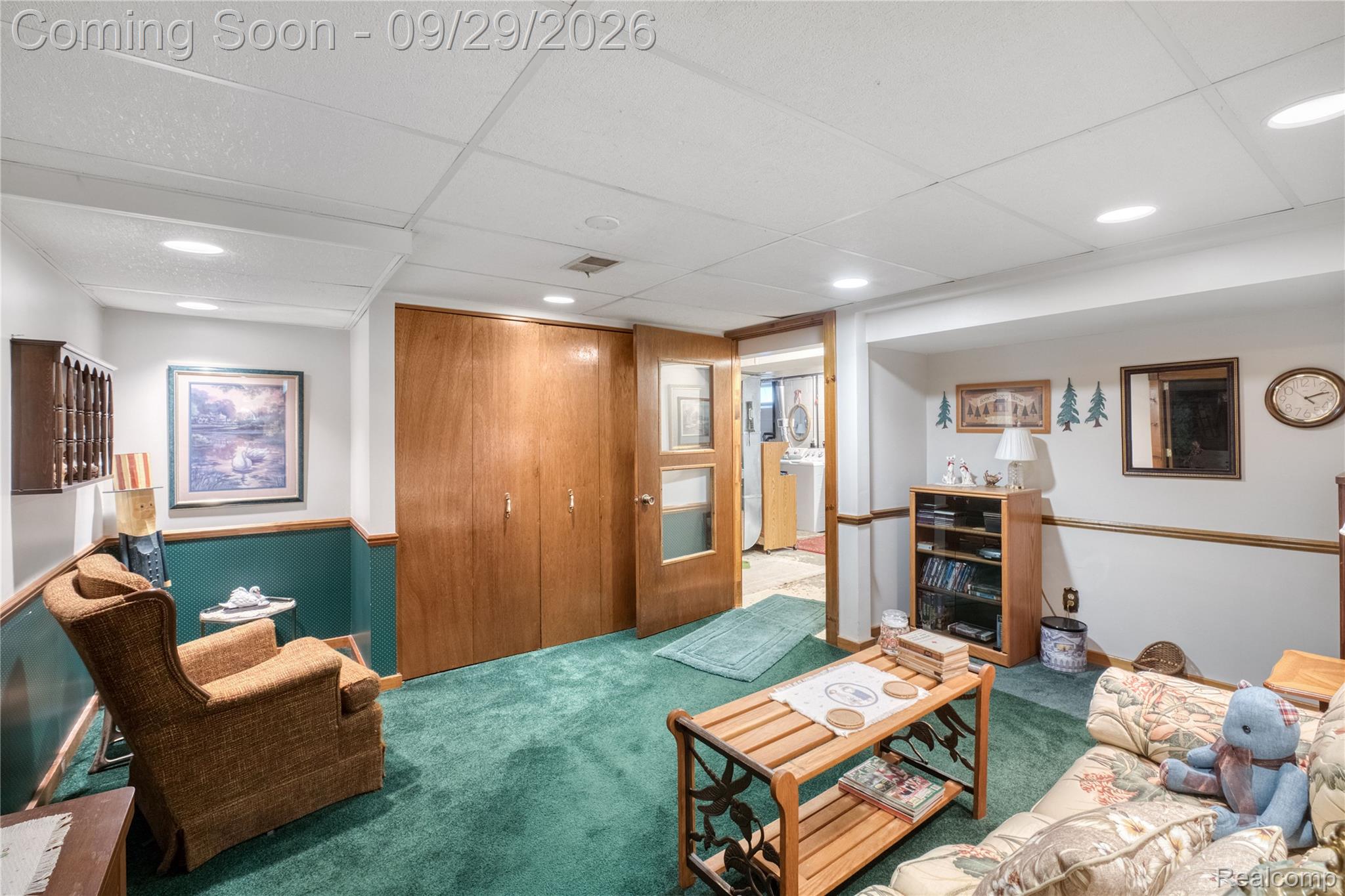 6411 Farrand Road Clio, MI 48420 - Photo 25 of 33 Recessed lighting, wood-finish doors, wainscoting, and carpet flooring