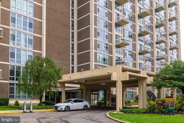 a view of a building with a garden