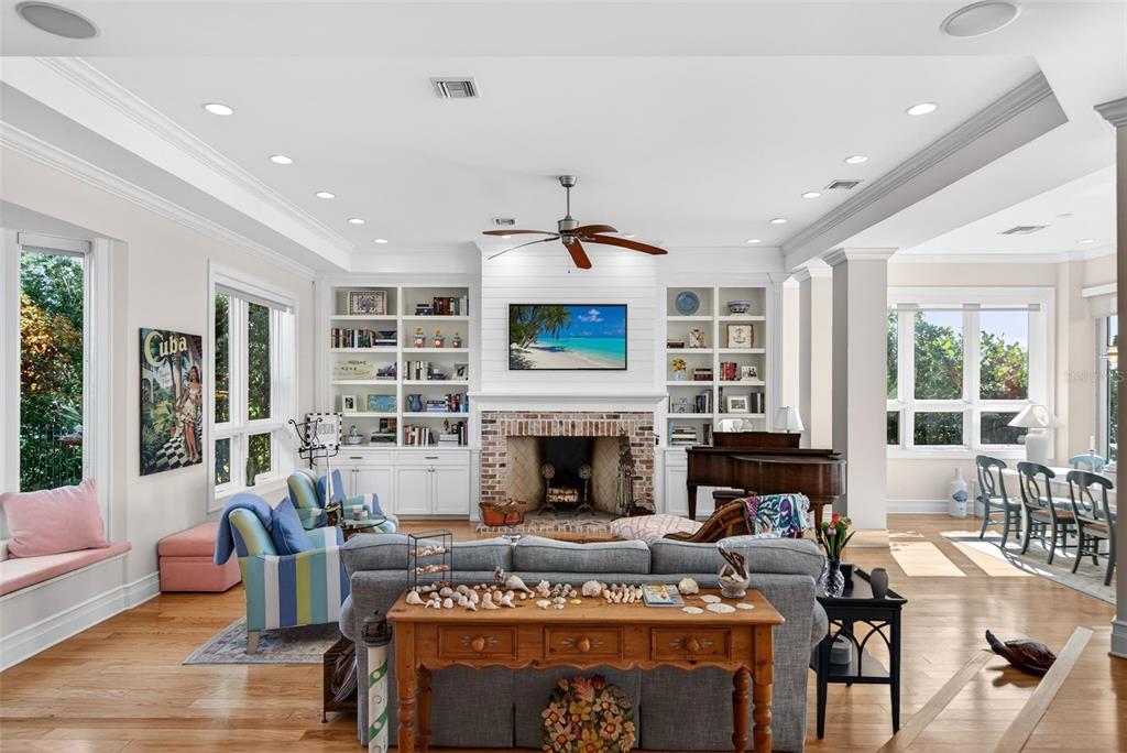 7152 Point Of Rocks Circle Sarasota, FL 34242 - Photo 16 of 88 a living room with furniture and a fireplace